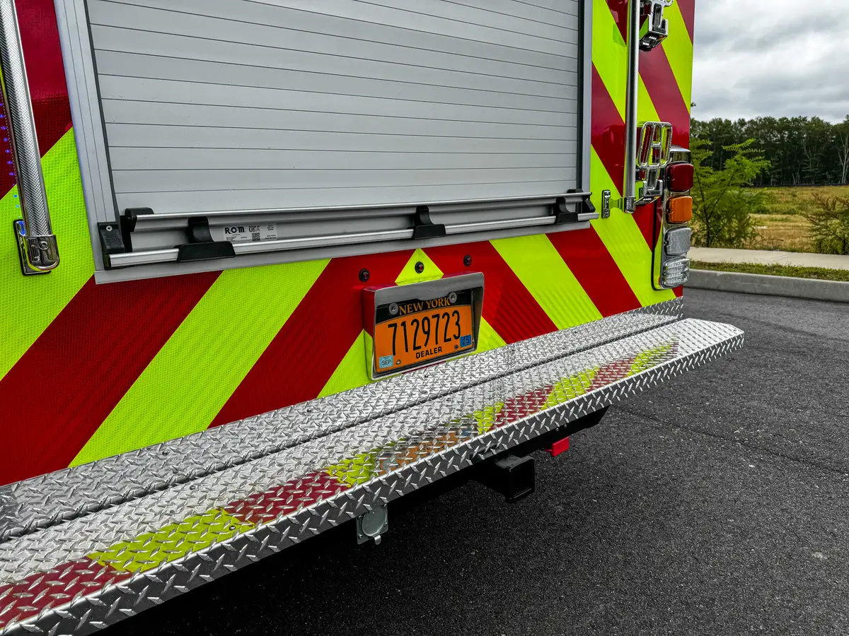 Underside rear bumper view showing frame members and tow points.